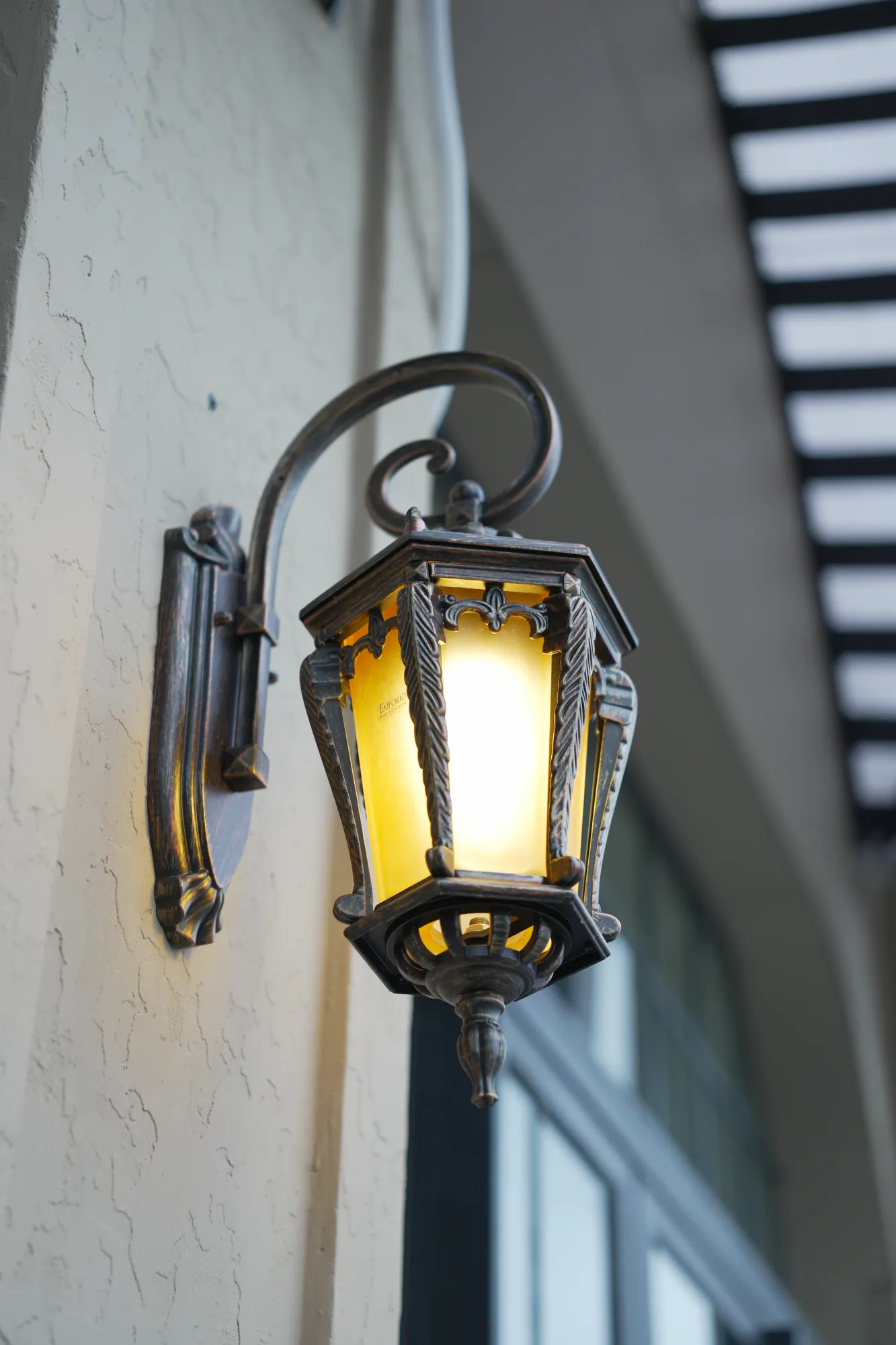 A wrought-iron lantern on the terrace wall